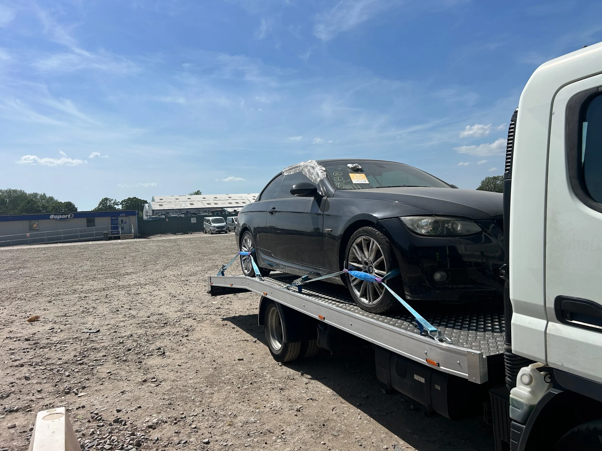 Copart vehicle recovery truck collecting auction car